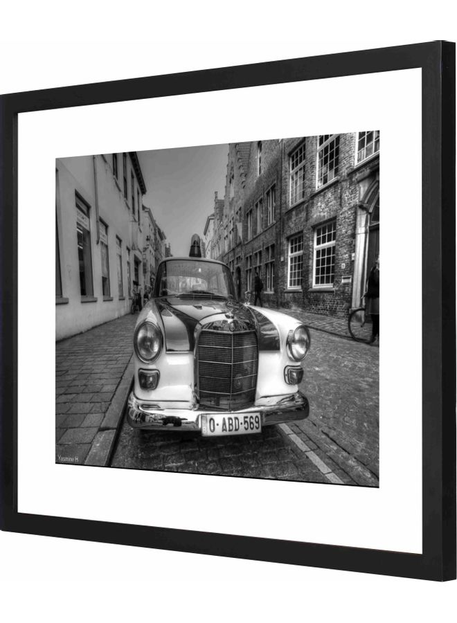 لوحة فنية جدارية بإطار مزينة بنمط يمثل سيارة قديمة أسود 43x53سم