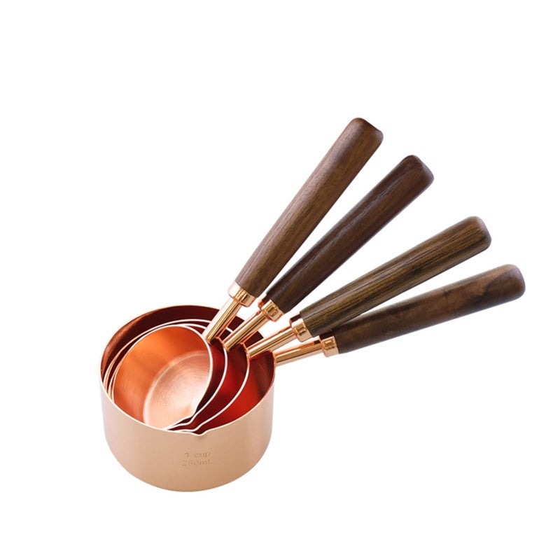 4-Piece Measuring Spoons Set Brown 18 x 4 x 5cm  - Image 1