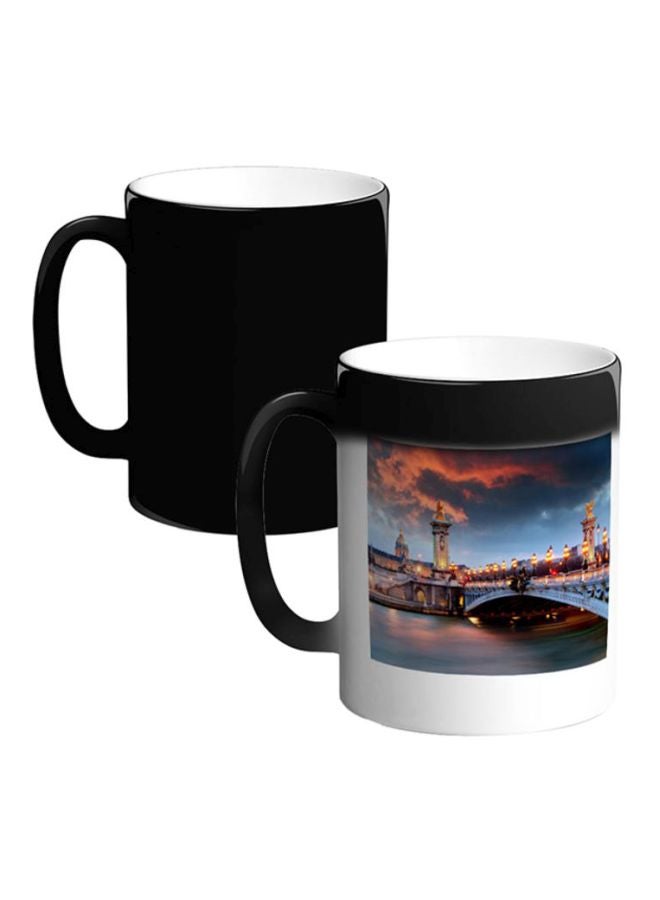 ديكالاك مج قهوة سحري من السيراميك بطبعة أبيض/أزرق/برتقالي