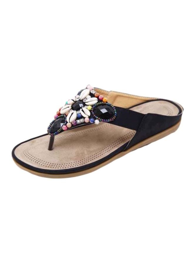 HUSK'SWARE - Stone Studded Slip-On Flat Sandals Beige/Black - Image 1