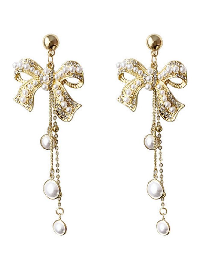 جونسون آند جونسون أقراط من الفضة الإسترليني عيار 925 بسن مدببة مرصعة باللؤلؤ بتصميم أنيق على شكل عقدة فيونكة - Image 1