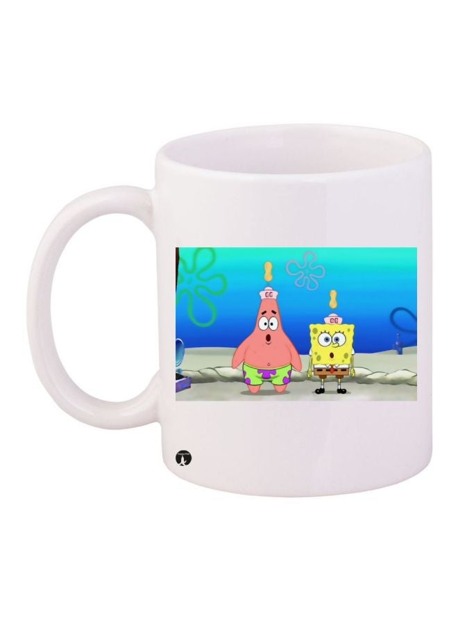 مج قهوة بطبعة من الرسومات الكرتونية "SpongeBob SquarePants" أبيض/أزرق/أصفر