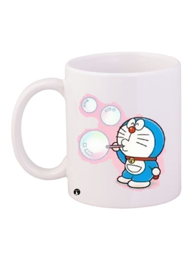 بي بي مج قهوة مزين بطبعة شخصية دورايمون أبيض/أزرق/وردي