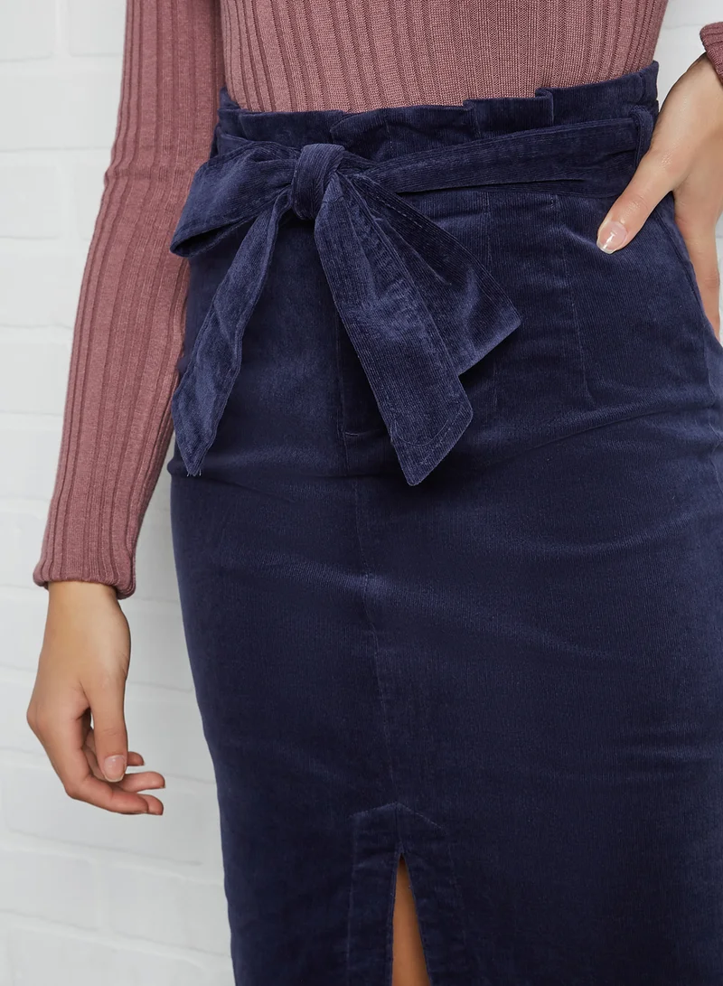 Generic تنورة متوسطة الطول بتصميم مكشكش وقماش مخملي مضلع وقصة مستقيمة كحلي