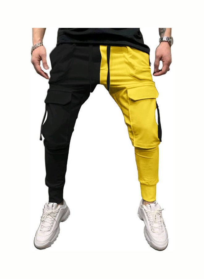 بنطال رياضي برباط بتصميم كتل الألوان أسود/أصفر - Image 1