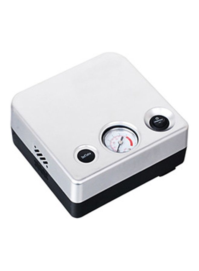 Car Tire Inflator Plugged Into Lighter - Image 1