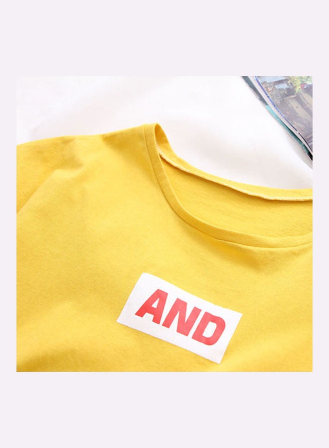 بلوزة كاجوال صيفية بتصميم تيشيرت فضفاض بفتحة رقبة مستديرة وأكمام متوسطة الطول أصفر - Image 4