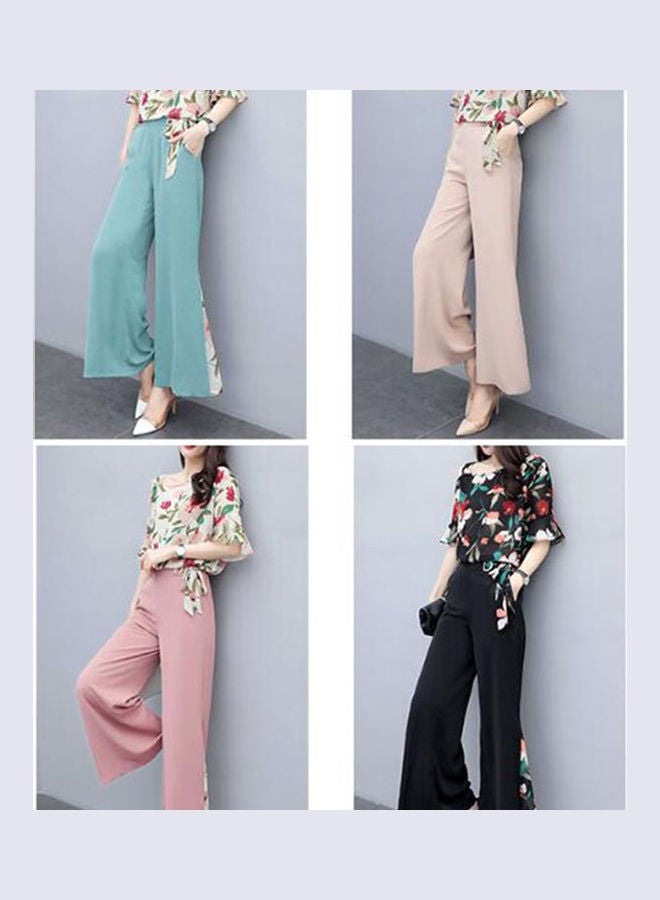 زي بدلة من بلوزة أنيقة بقصة ضيقة وبطبعة زهور مع بنطال بأرجل واسعة أسود - Image 3