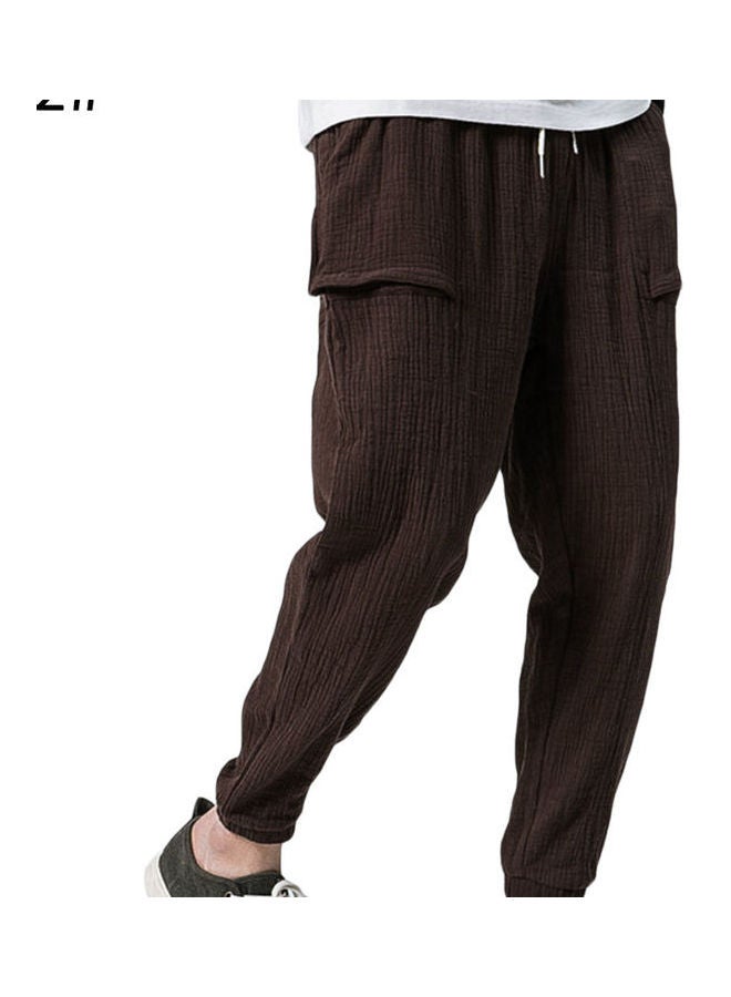 بنطال رياضي كاجوال للرجال بقصة واسعة ورباط عند الكاحل بني - Image 1