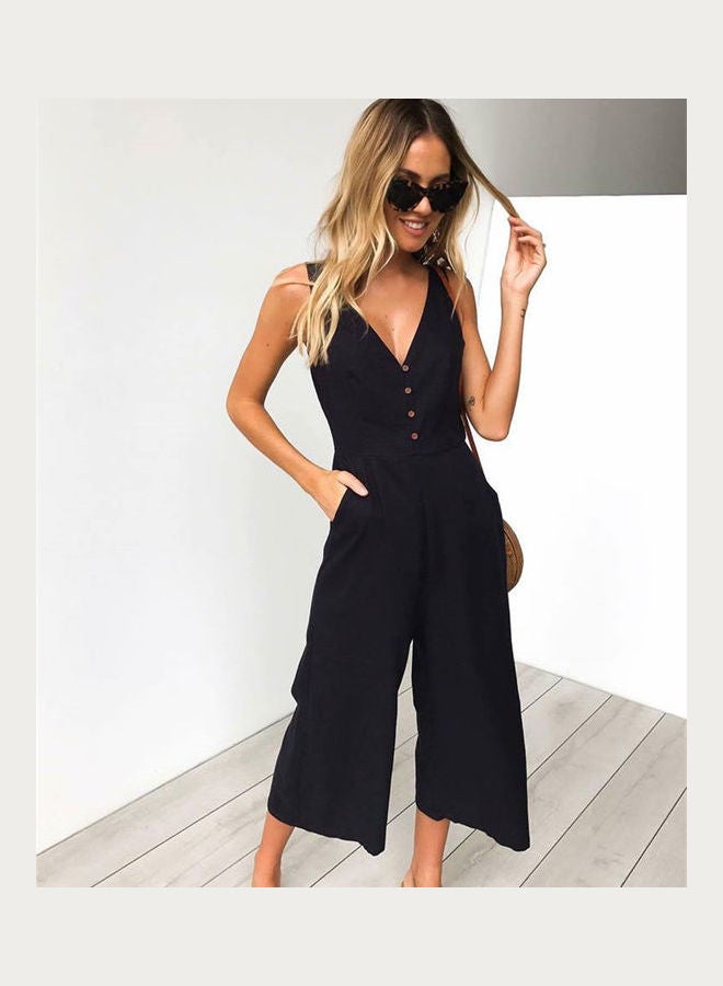 جمبسوت سادة مزودة بجيب وفتحة رقبة على شكل حرف V أسود