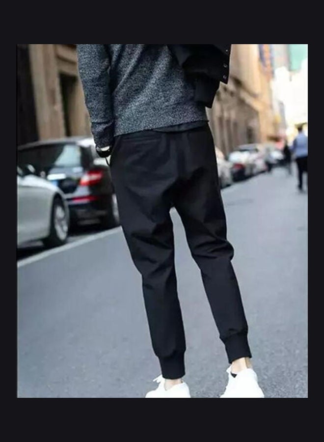 بنطال واسع بقصّة سروال ومربوط من عند الكاحل من مادة سميكة أسود - Image 2