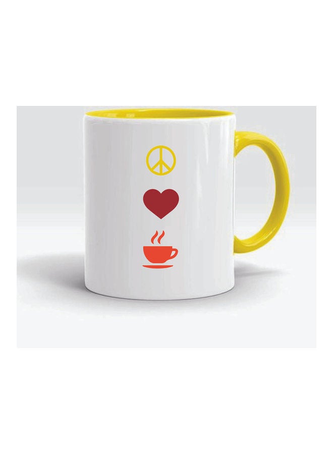 اف بي جينيكس مج من السيراميك بطبعة عبارة "Peace Love Coffee" أصفر/أبيض/أحمر - Image 1