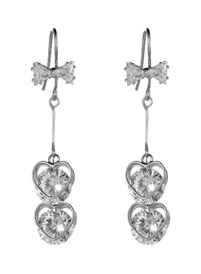 جونسون آند جونسون أقراط متدلية مرصعة بالزركونيا مزيّنة بتصميم عقدة فيونكة - Image 1