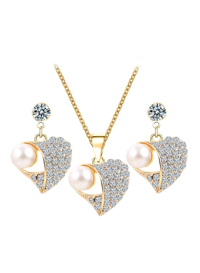 شاربدو طقم قلادة وأقراط على شكل قلب مُرصع بأحجار الراين واللؤلؤ - Image 1