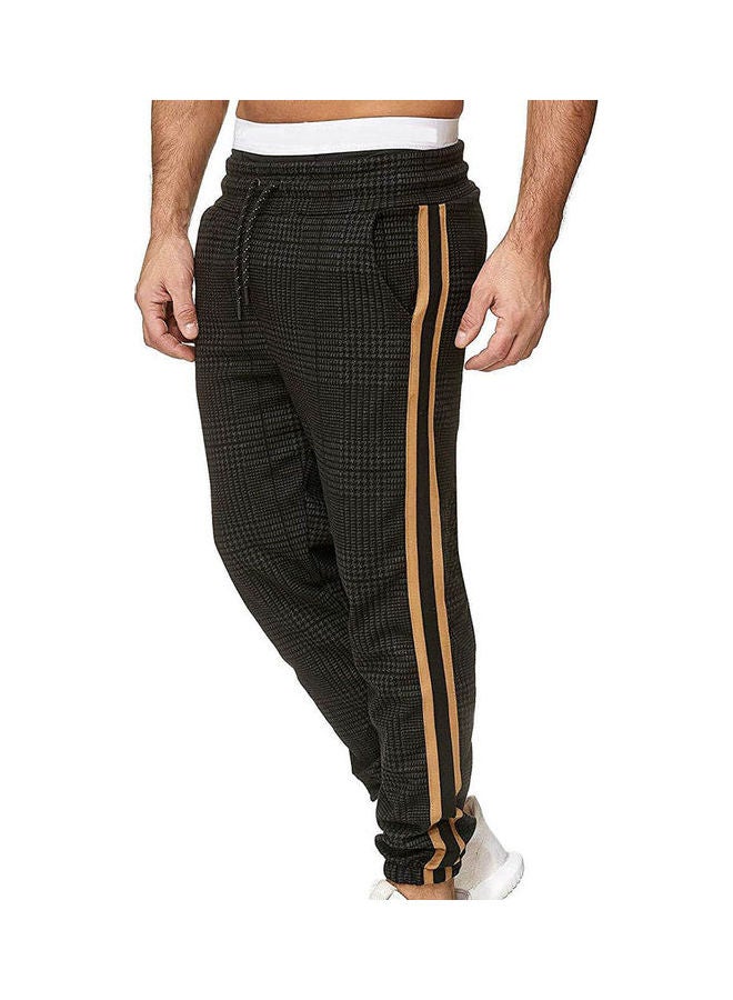 بنطال برباط مربوط حول الكاحل أسود/أصفر - Image 1