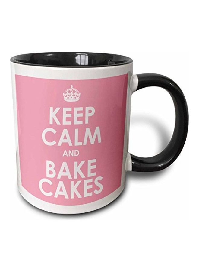 مج مطبوع عليه عبارة "Keep Calm And Bake Cake" أسود