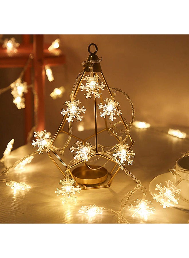 شريط إضاءة مكون من 100 مصباح LED على شكل ندفة ثلج ورجل ثلج . أصفر 10متر - Image 1