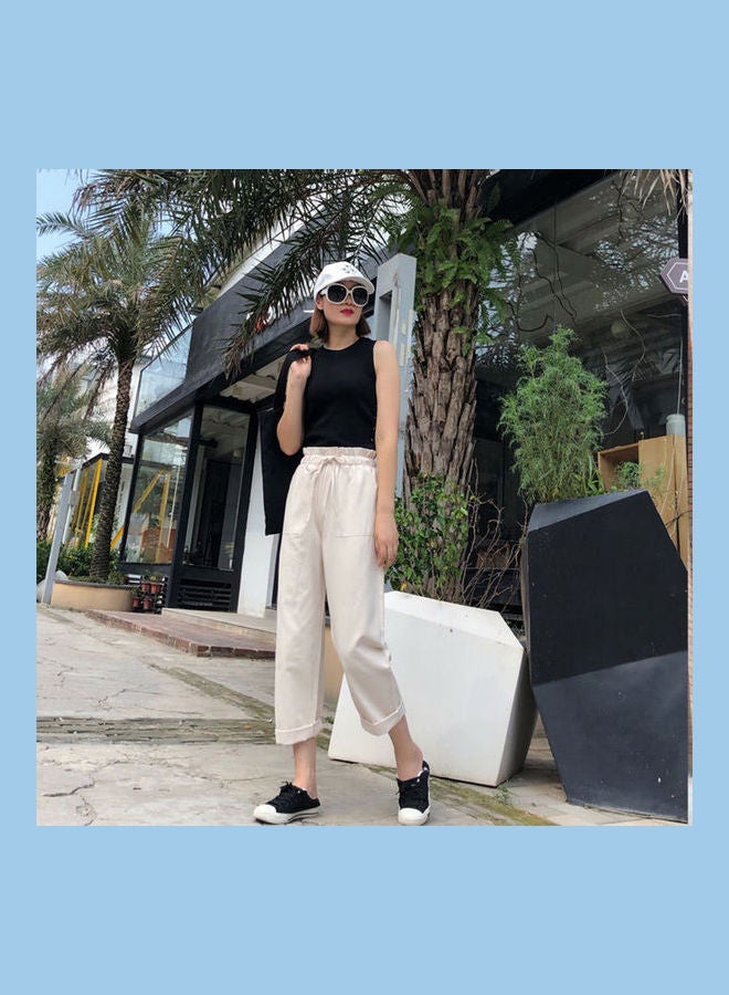 بنطال هارلان فضفاض بقصة أرجل واسعة بيج - Image 3
