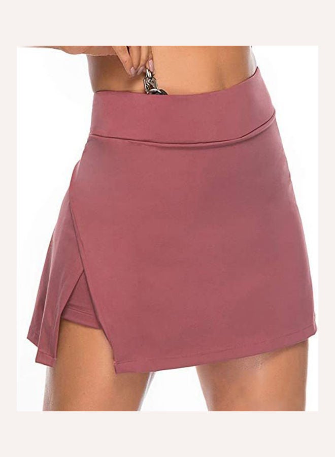 تنورة قصيرة سادة بقصة ضيقة وردي