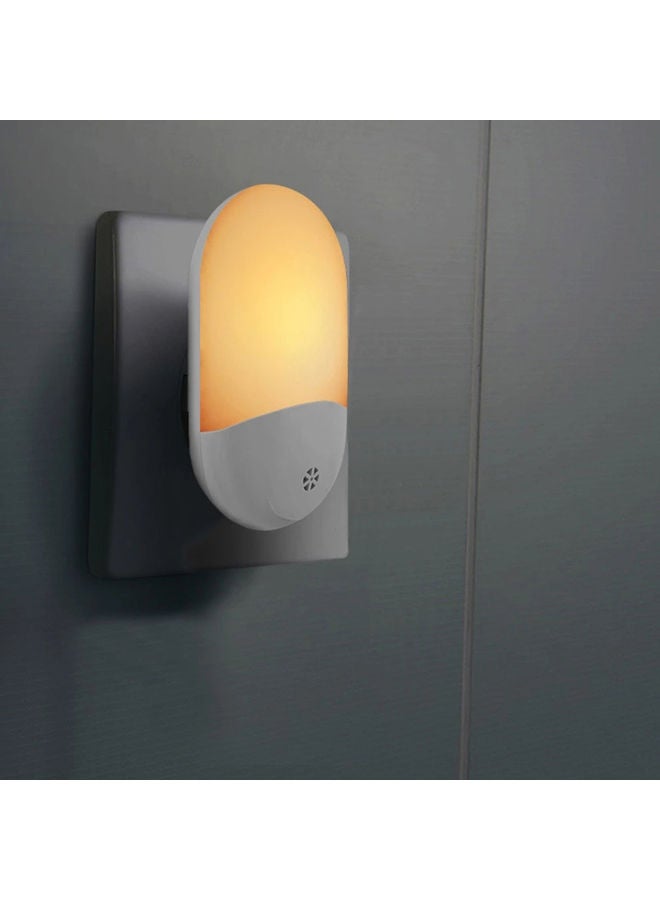 مصباح ليلي LED بإضاءة ليلية مزود بجهاز استشعار ضوئي ذكي ومقبس أصفر 18 x 6.2 x 14سم  - Image 2