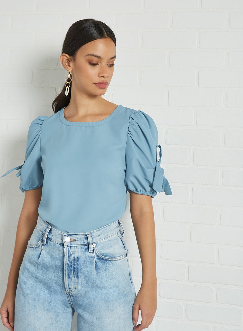 Aila Solid Design Eyelet Sleeves Detail Top Blue  - Image 1