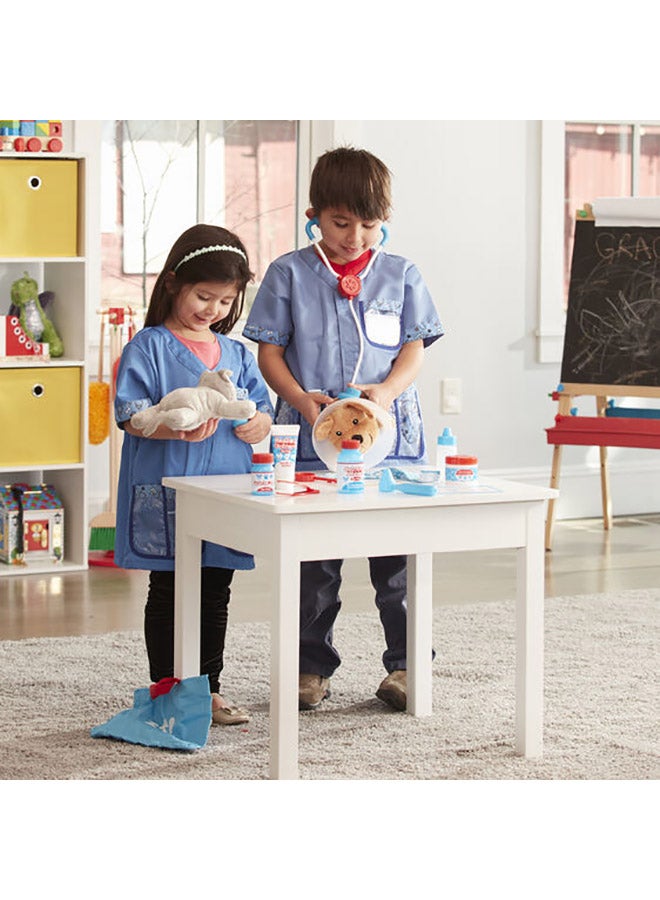 Melissa & Doug - 24-Piece Examine And Treat Pet Vet Set - Image 1
