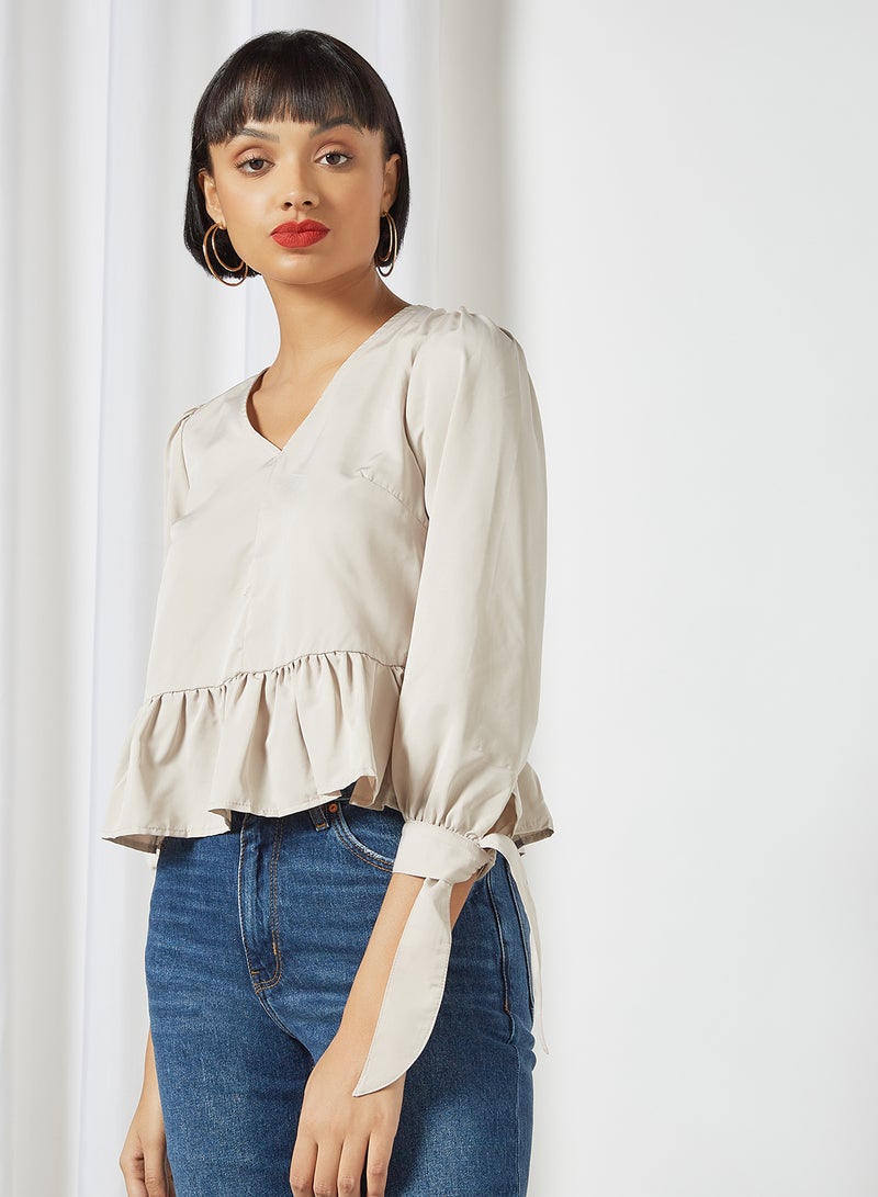 Aila Solid Design V-Neck With Bow Cuff Top Beige - Image 1