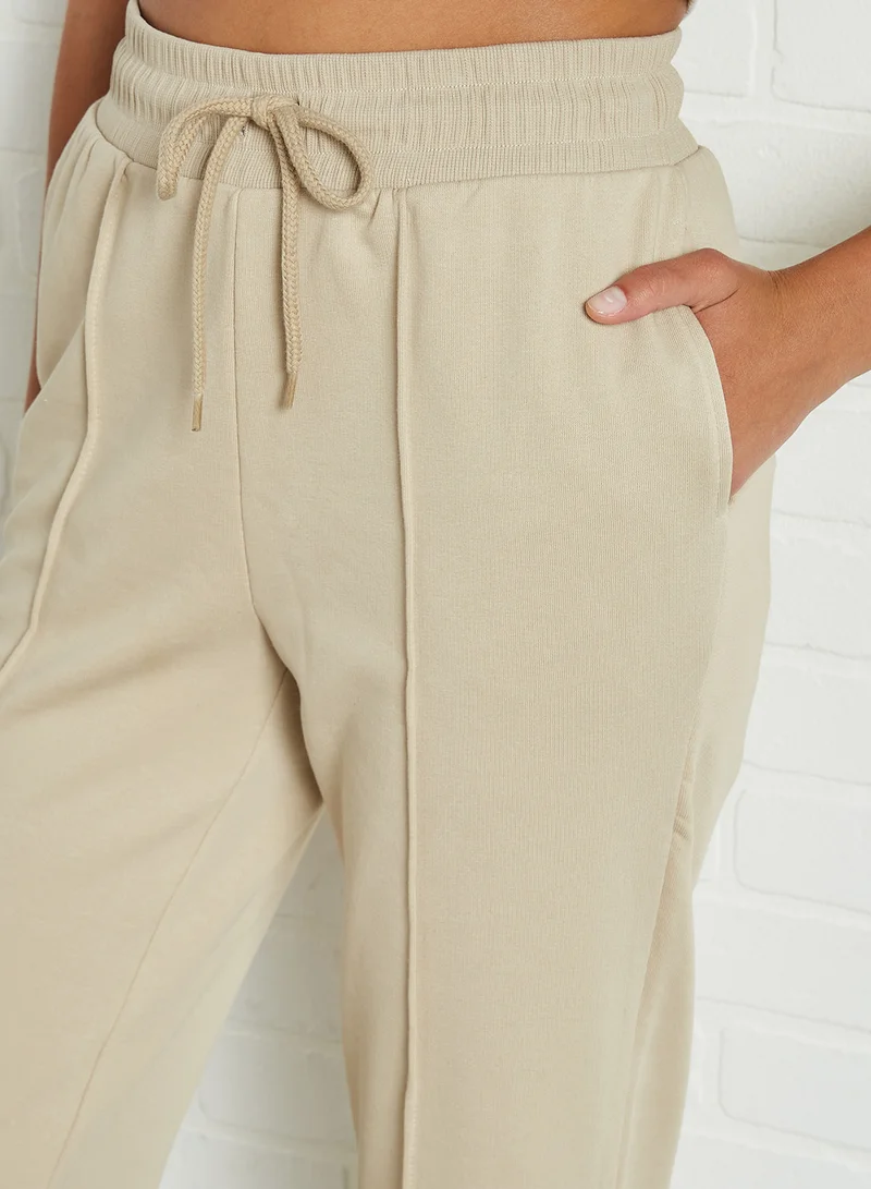 NA-KD Drawstring Elastic Sweatpants Beige