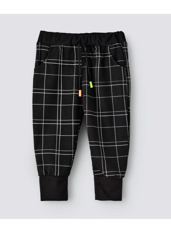 babyqlo Checked Printed Mid -Rise Joggers Black/White  - Image 1