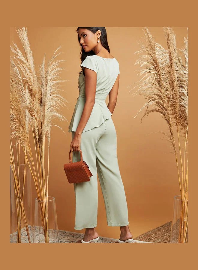 Closet By Styli Boat Neck Peplum Detail Jumpsuit Green