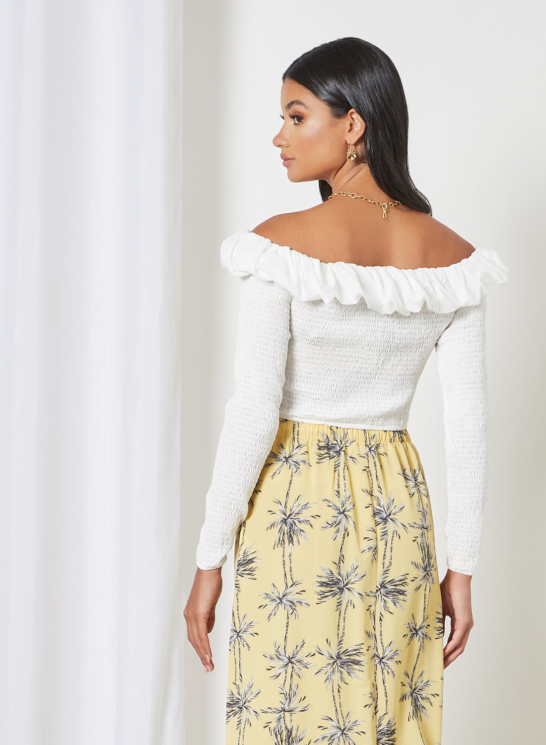white smocked off the shoulder top