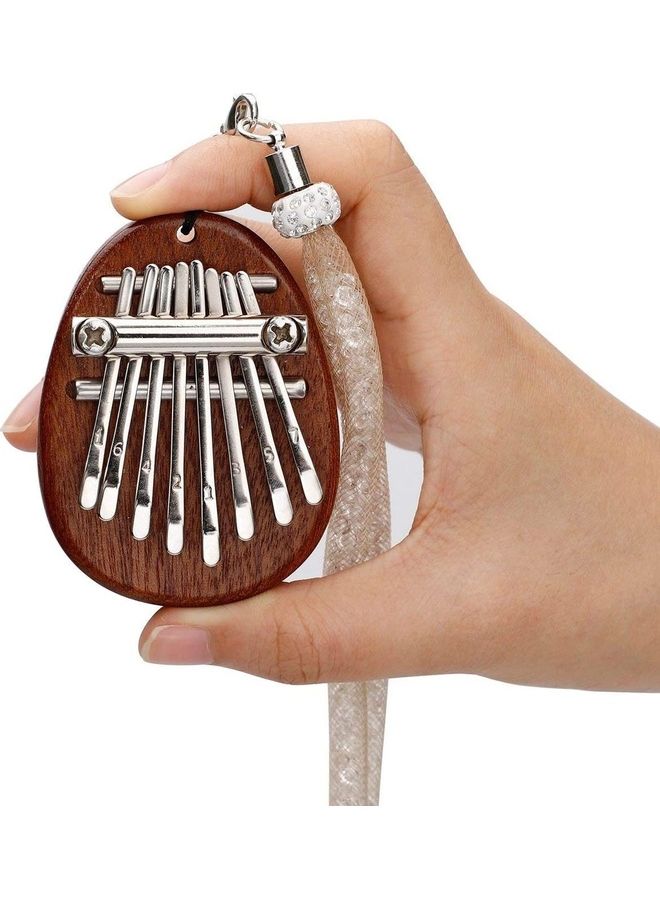 XiuWoo 8-Keys Portable Kalimba Thumb Piano With Hanging Cord  - Image 1