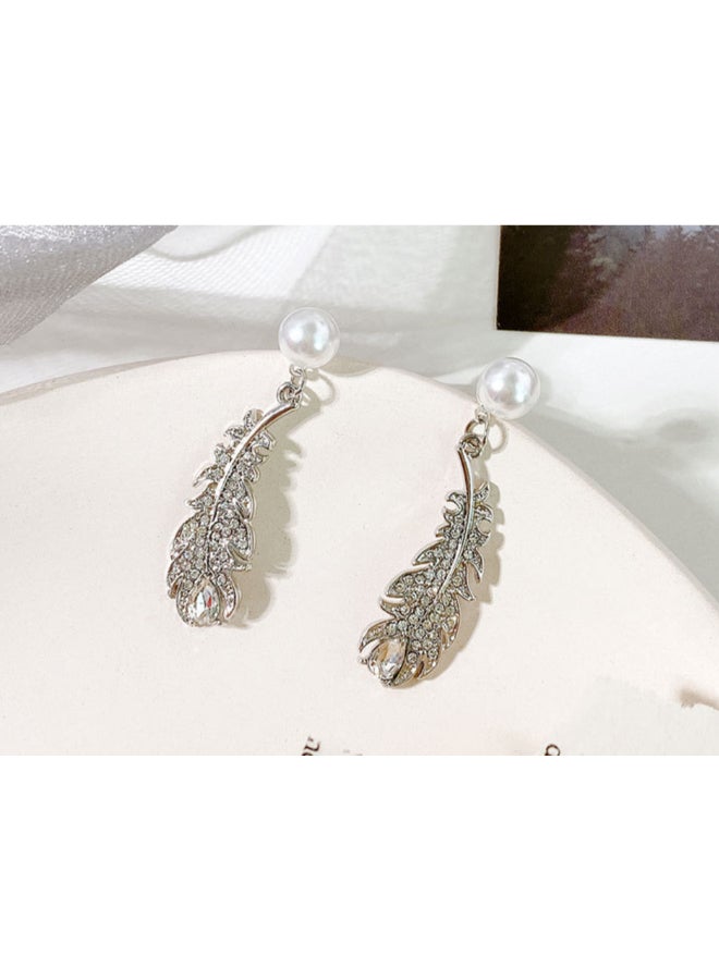J.J Hand made Pearl Feather Shaped Earrings - Image 2