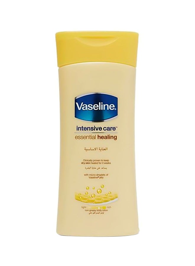 فازلين لوشن أساسي لعلاج الجسم أصفر/أزرق 400ملليلتر