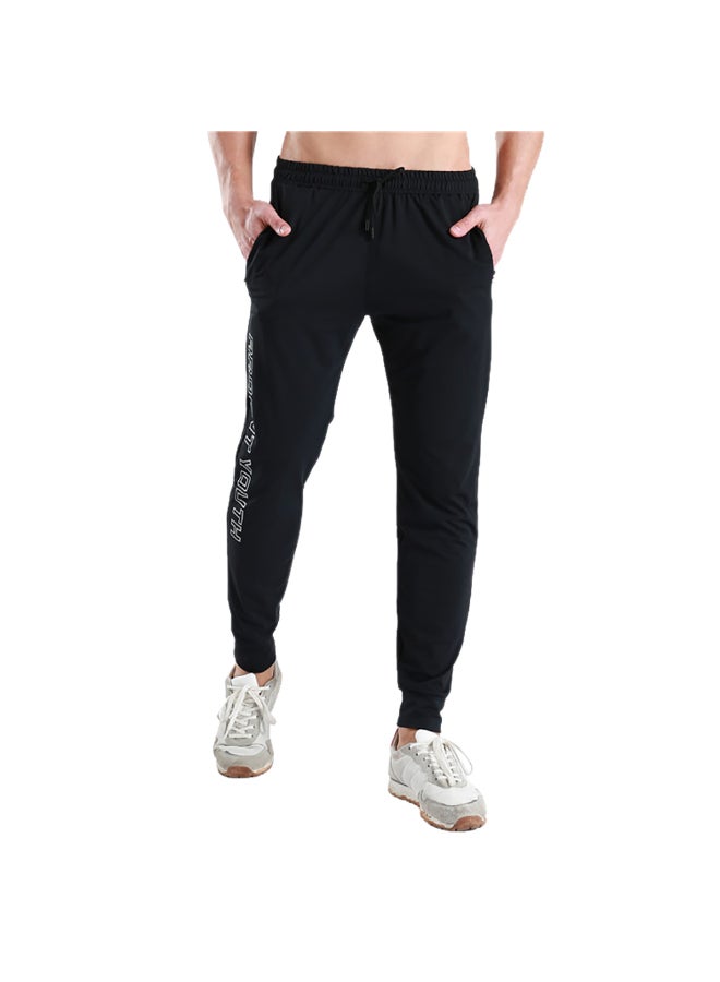بنطال رياضي خفيف جيد التهوية برباط أسود - Image 1