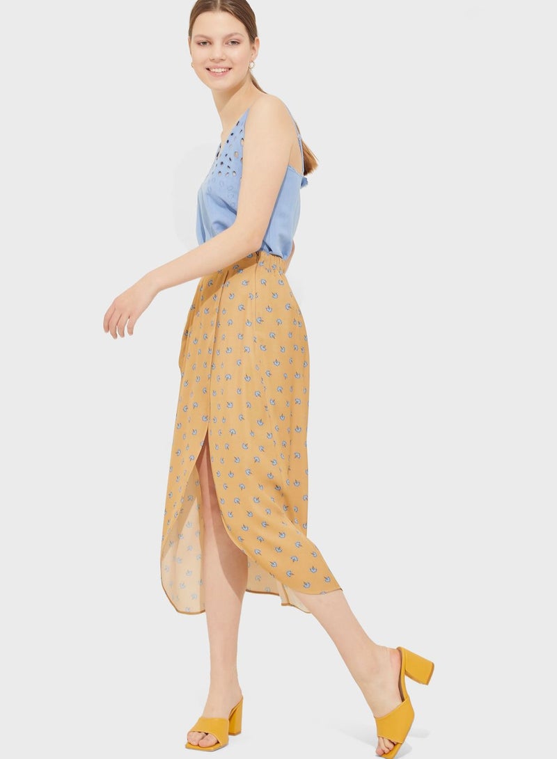 اي دي ال تنورة متوسطة الطول بتصميم ملفوف ومزينة بطبعة بني/ أزرق - Image 3