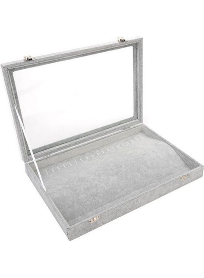 صندوق مجوهرات مخملي ثلجي مع غطاءٍ شفاف.