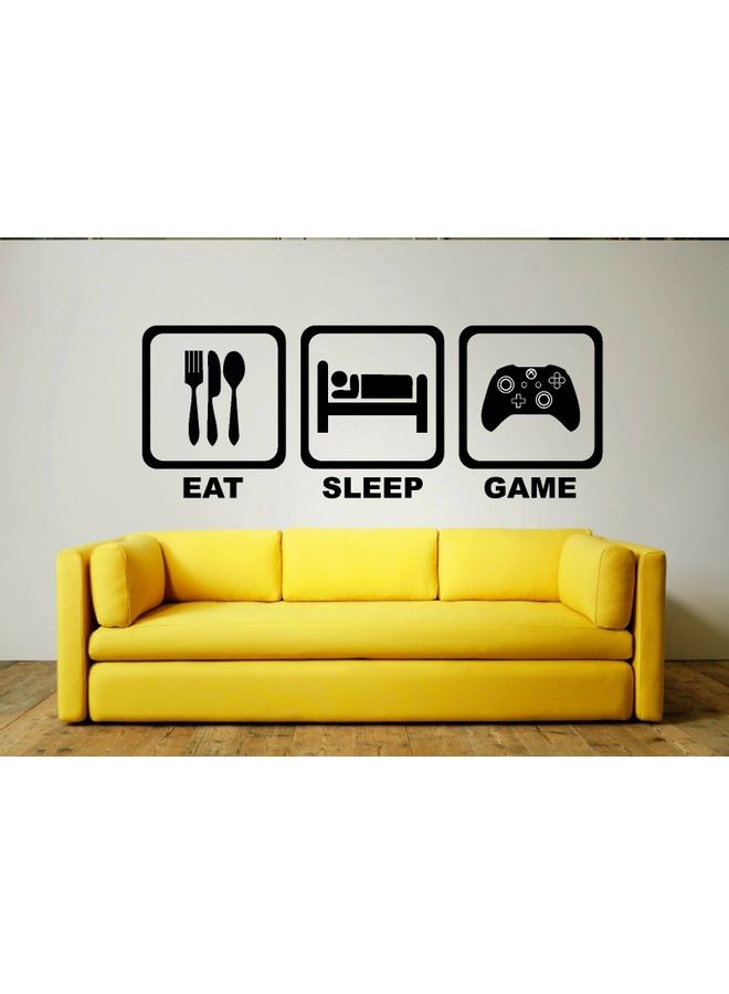 إربان تراندز ملصق جداري فني من الفينيل بتصميم ذراع تحكم لجهاز البلايستيشن وعبارة "Eat Sleep Game" أسود 