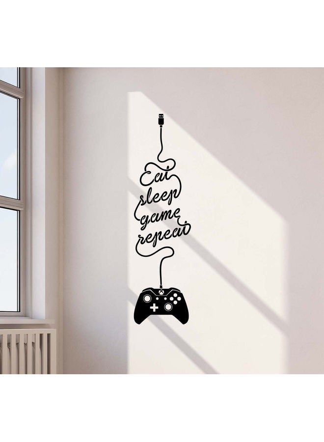 إربان تراندز - ملصق جداري فني من الفينيل بتصميم ذراع تحكم لجهاز البلايستيشن وعبارة "Eat Sleep Game" أسود - Image 1