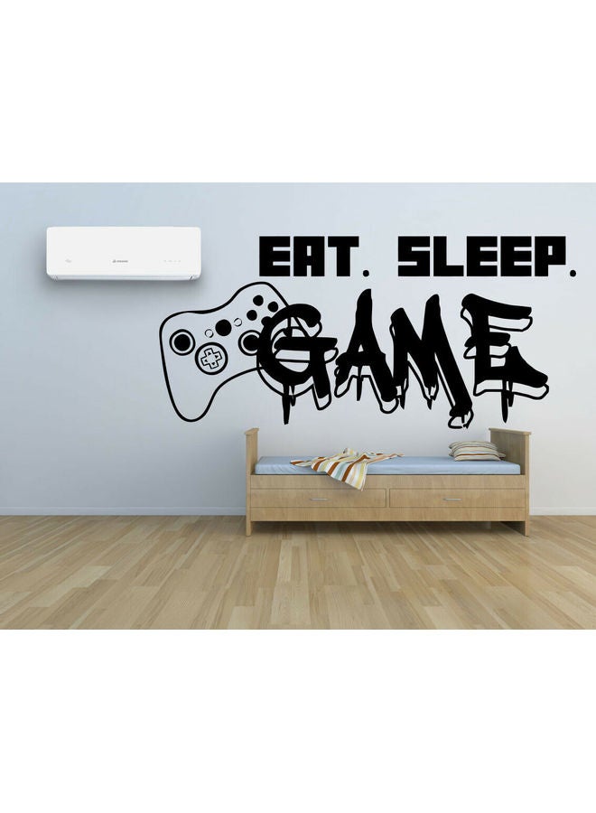 إربان تراندز - ملصق جداري فني من الفينيل بتصميم ذراع تحكم لجهاز البلايستيشن وعبارة "Eat Sleep Game" أسود - Image 1