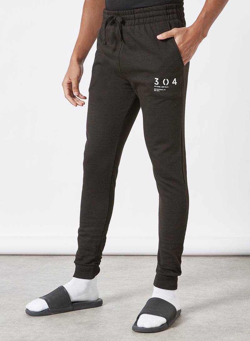 304 - Stamp Print Joggers Black - Image 1