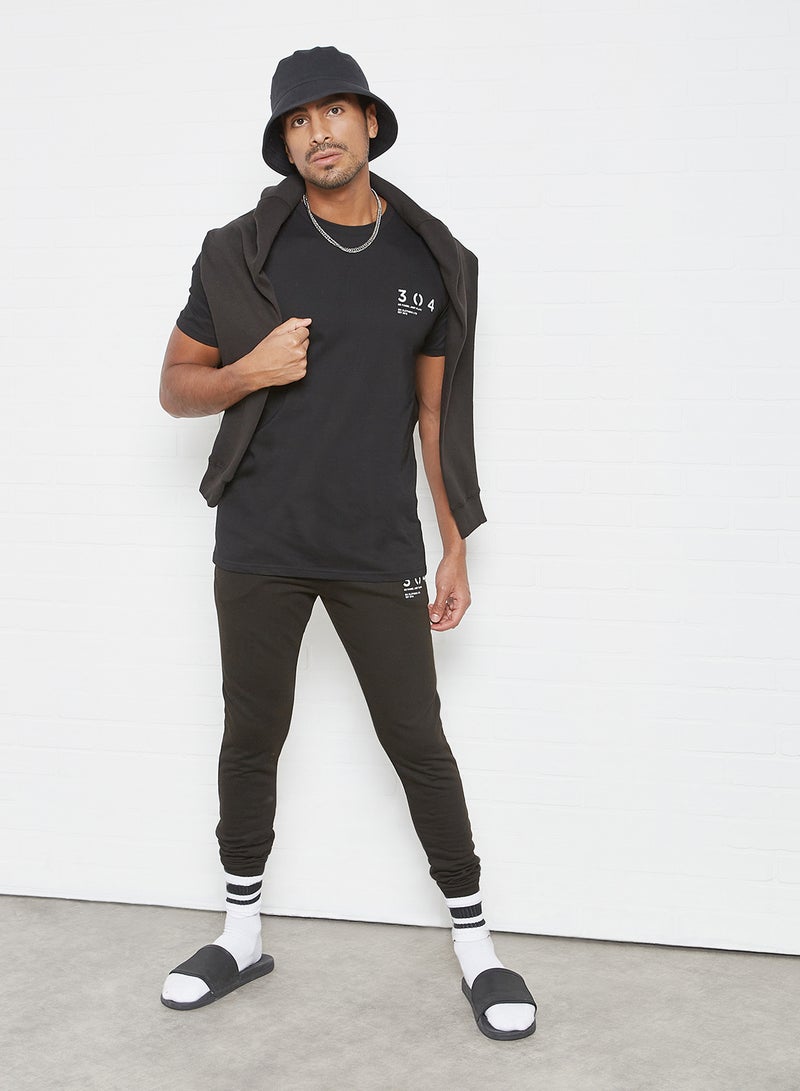 304 - Stamp Print Joggers Black - Image 1