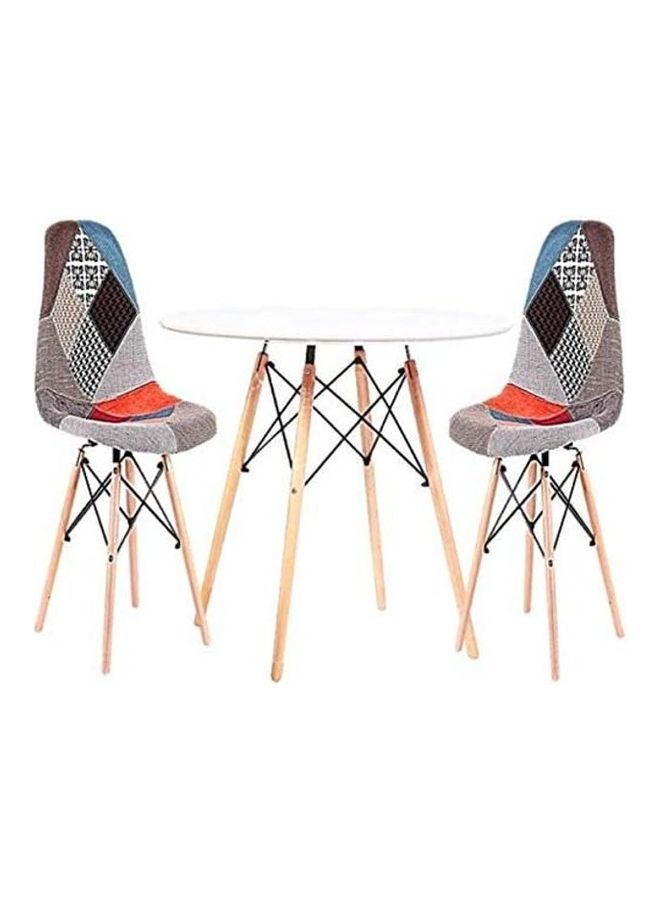 AKF 3-Piece Round Table With Patchwork Cushioned Eames Chairs Multicolour - Image 1