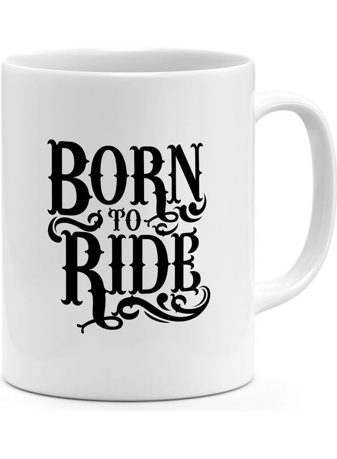مج قهوة بتصميم طبعة عبارة "Born To Ride" أبيض/ أسود 18سم - Image 1