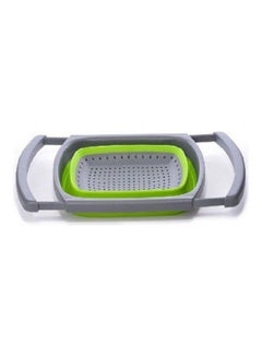 A Vegetable Strainer With A Silicon Strainer Green
