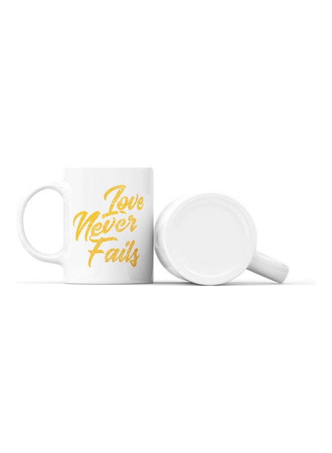 LOUD UNIVERSE Love Never Fails Printed Coffee Mug White/Yellow  - Image 2