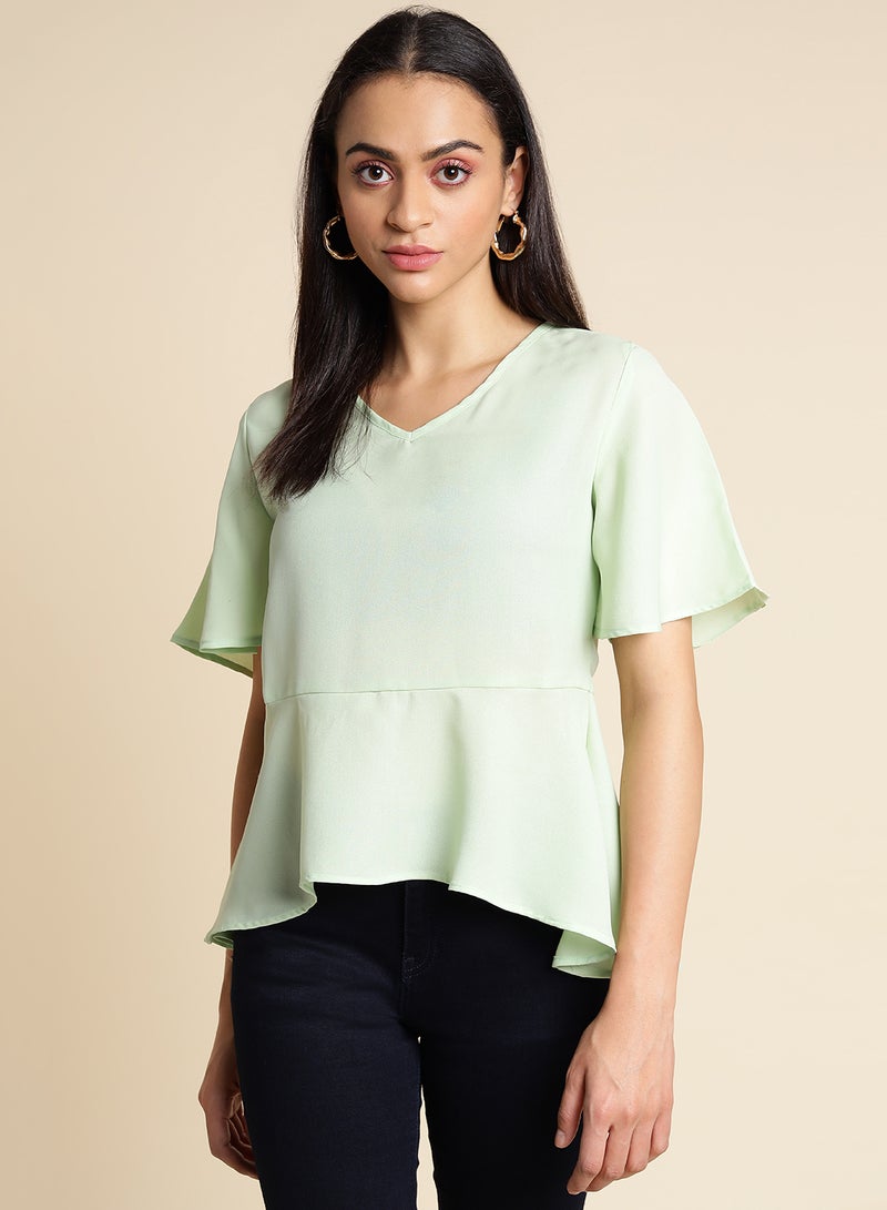 Aila Plain Ruffle Top light green  - Image 1