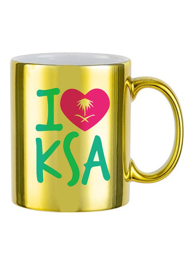 إم إي سي مج مطبوع عليه عبارة "I Love KSA Saudi National Day" ذهبي
