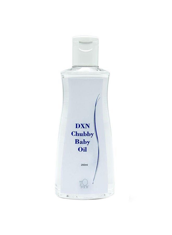 دي اكس ان زيت أطفال بمستخلص جنين القمح - Image 1