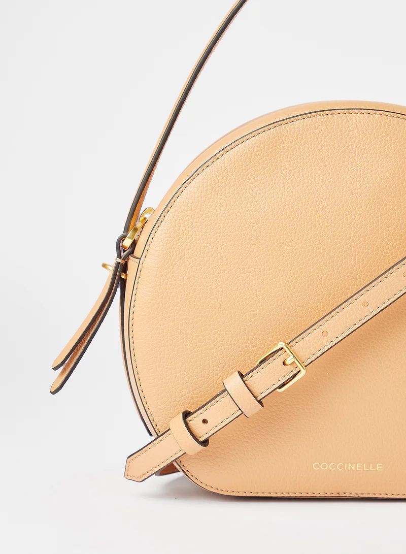 COCCINELLE Leather Circular Crossbody Bag Beige